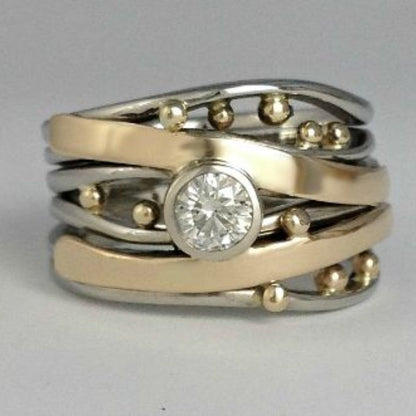 Bague en Or et Argent Ornée d’un Zircon