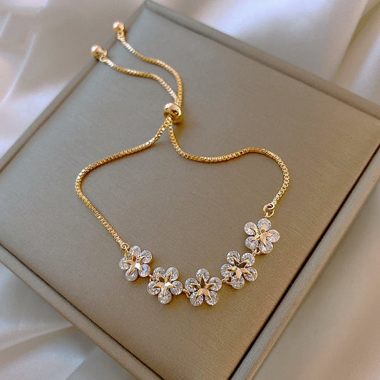 Gold Floral-Design Bracelet with Crystal