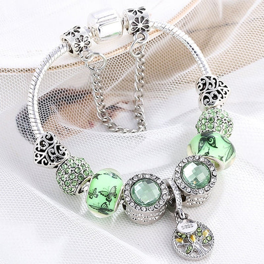 Elegant Silver Bracelet with Green Crystals