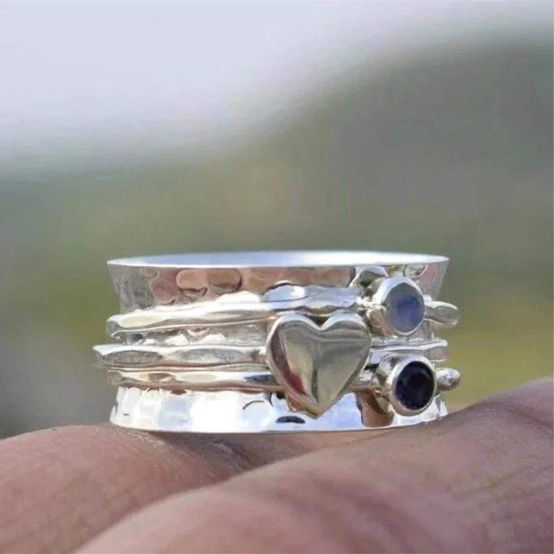 Elegant Silver Ring with Spinning Heart
