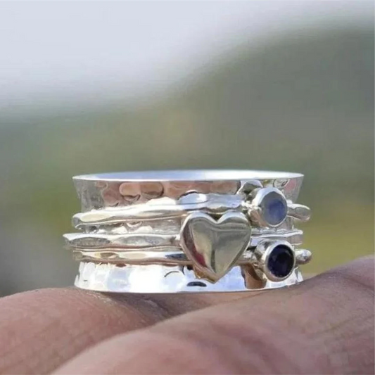 Elegant Silver Ring with Spinning Heart